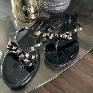 Studded jelly flip flops
